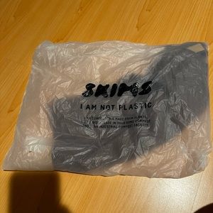 SKIMS cut out one shoulder dress